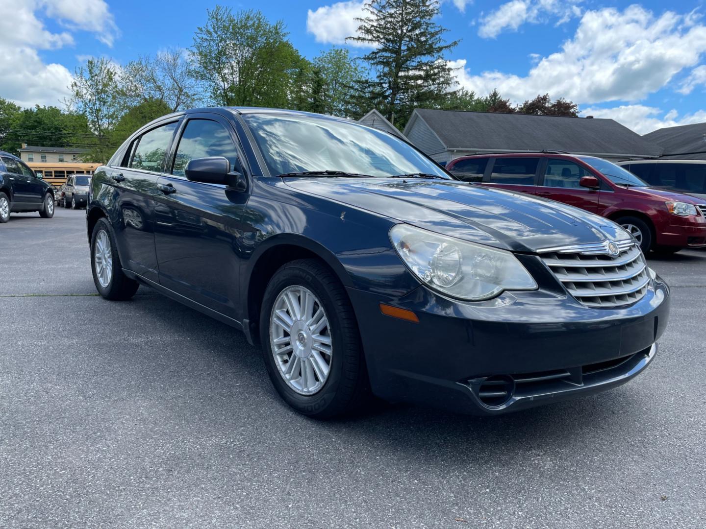 2008 blue Chrysler Sebring Sedan Touring (1C3LC56R58N) with an 2.7L V6 DOHC 24V FFV engine, 4-Speed Automatic Overdrive transmission, located at 101 N. Main Street, Muncy, PA, 17756, (570) 546-5462, 41.207691, -76.785942 - Photo#0